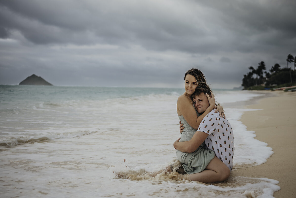 Couple sitting  on lanikai beach