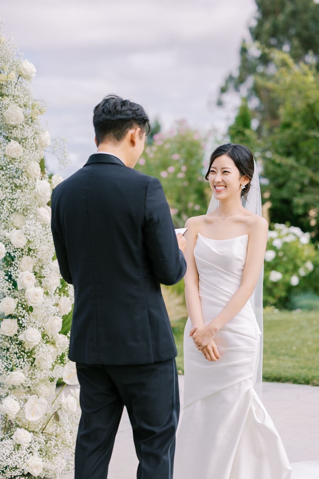 couple-with-flowers-behind