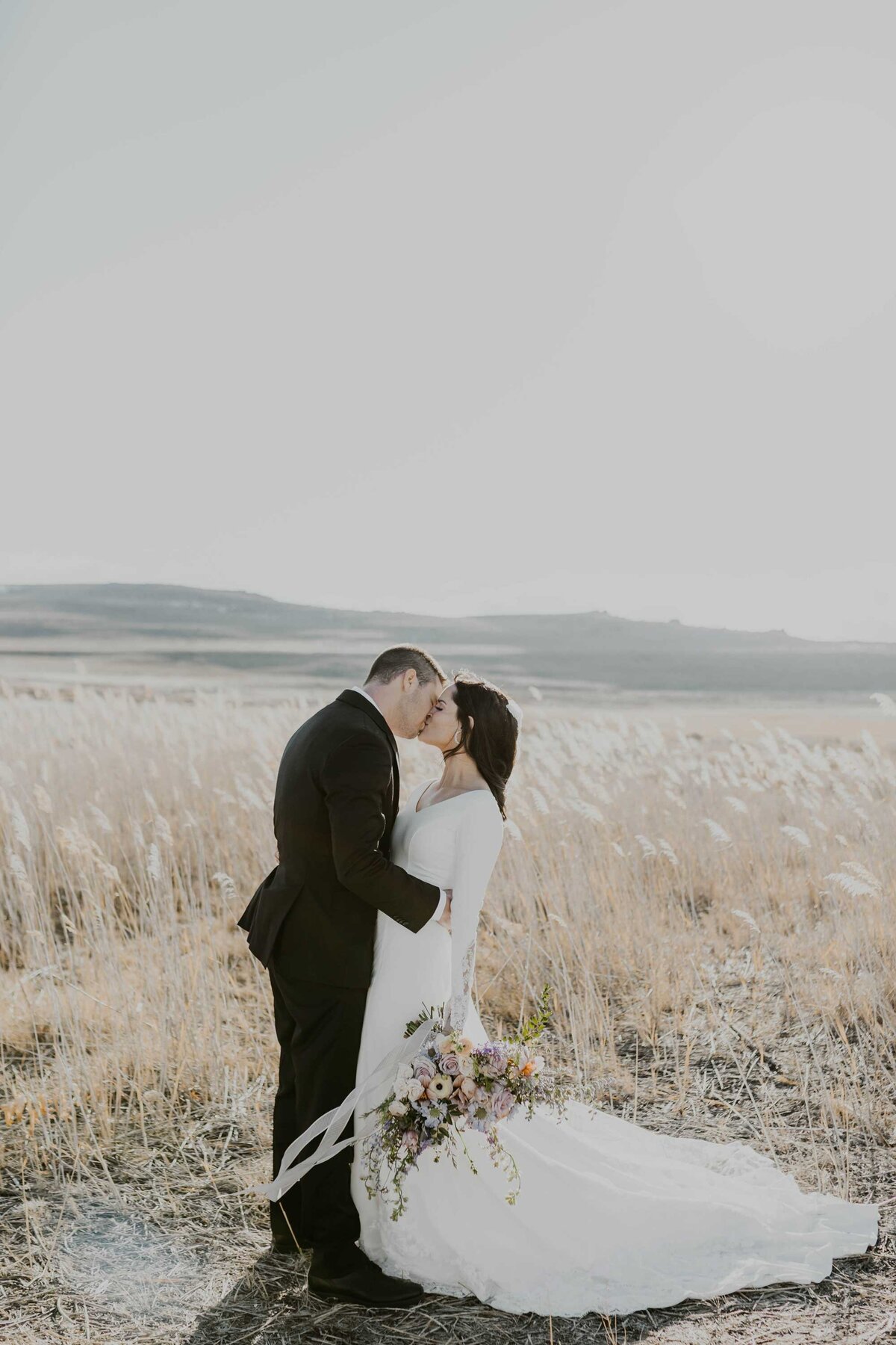 bride-and-groom-kissing