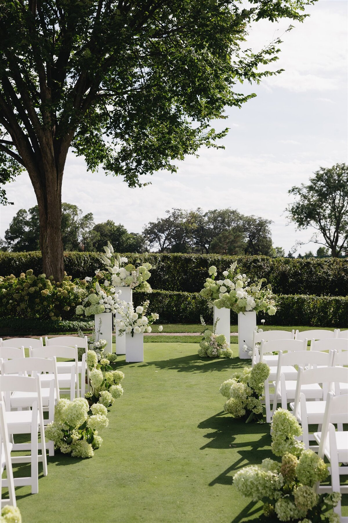 white and green wedding ceremony