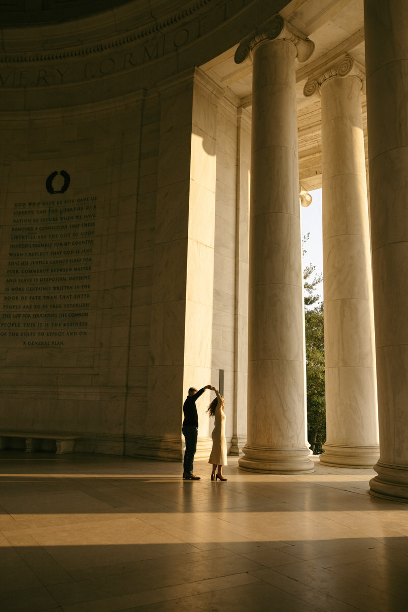 A sunrise engagement session at the Jefferson Memorial