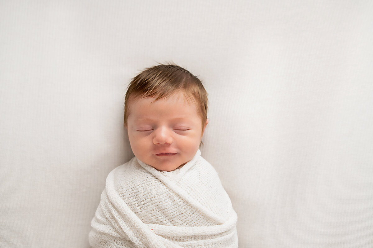 happy-sleeping-baby-boyCuyahoga-Falls-Newborn-Photographer