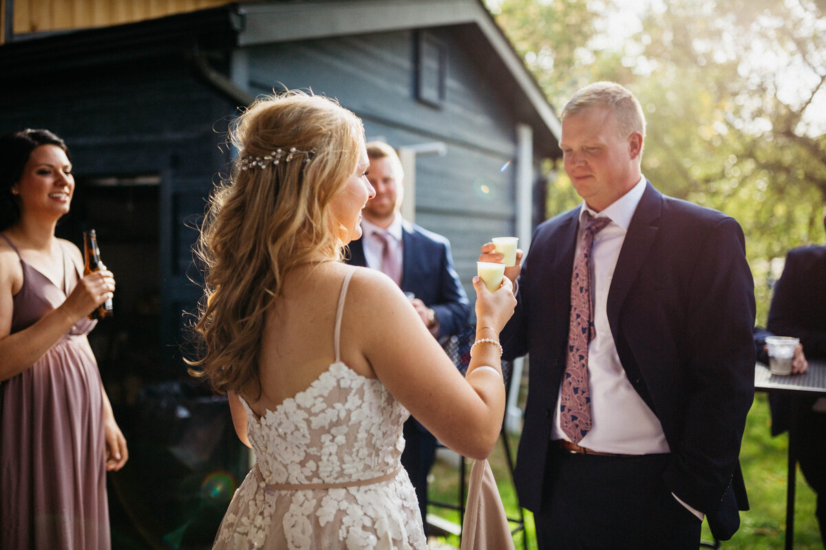 bride-and-groom-taking-shots