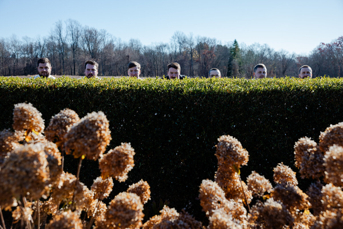 A Wes Anderson Themed photograph of groomsmen.