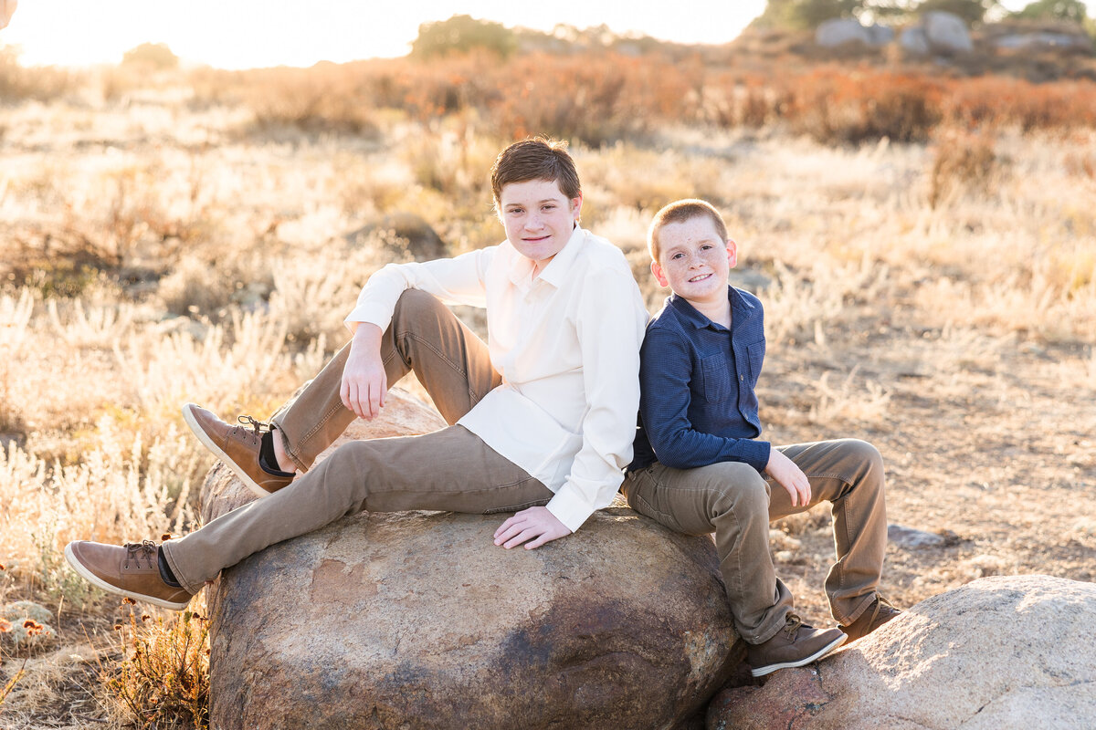 brothers sitting on rock wrights field san diego