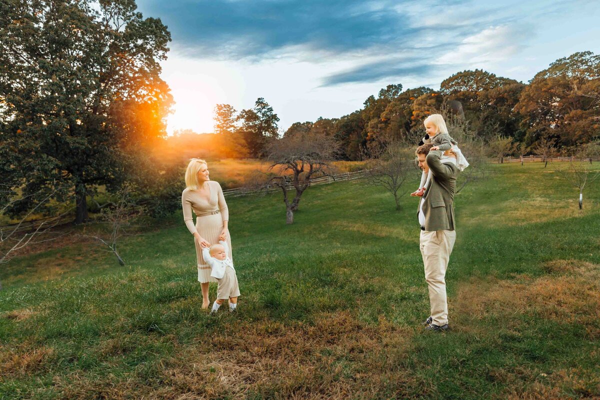 family playing on hilltop long island family photography