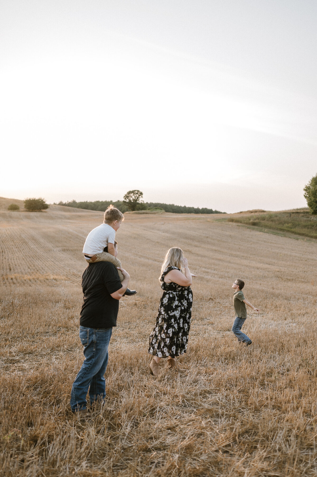 Family in a wheat field