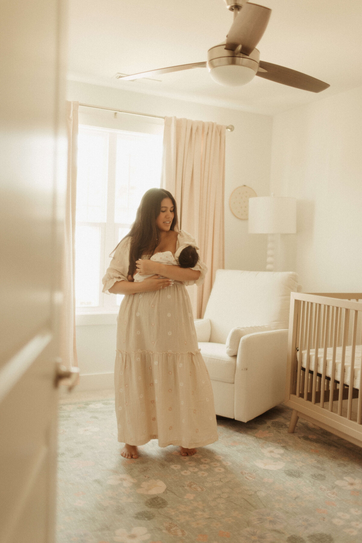 Baby swaddled in cream knit blanket during Franklin TN lifestyle newborn shoot