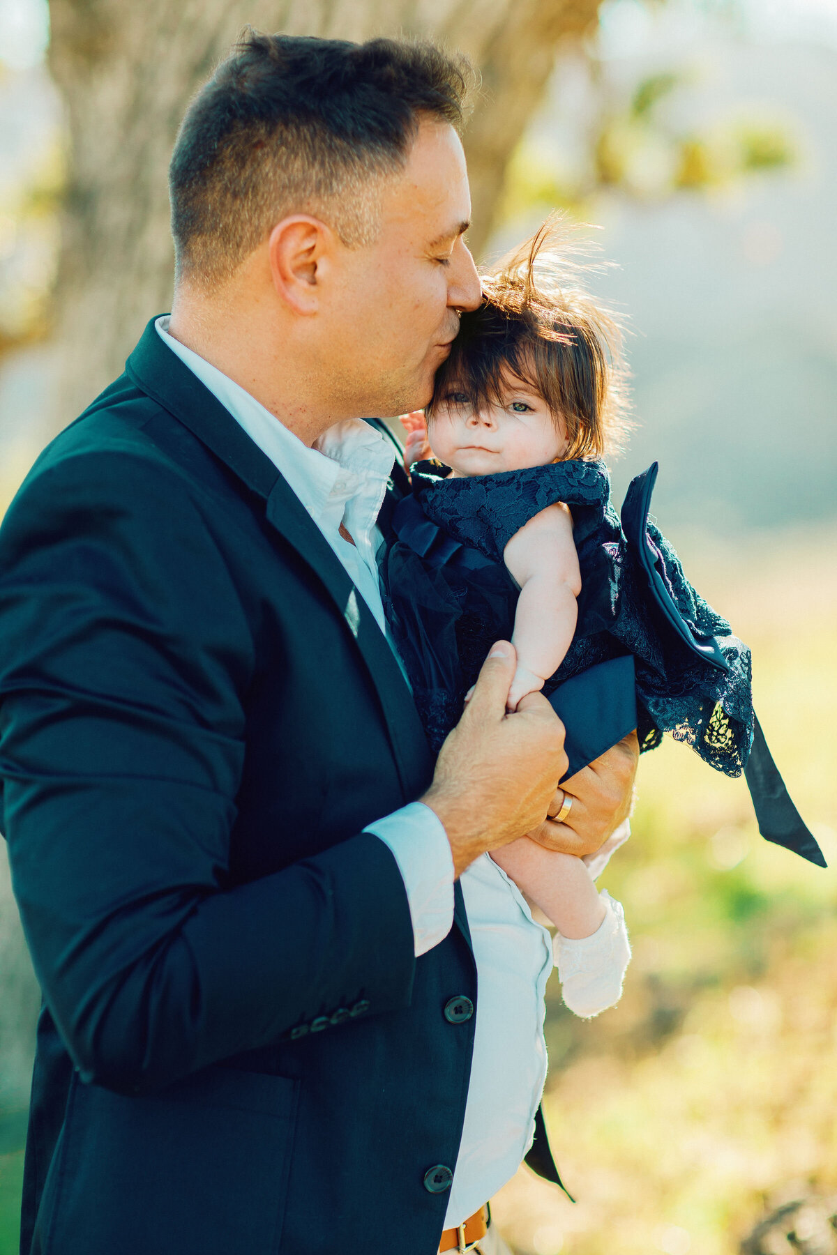 Family Portrait Photo Of Father Kissing His Baby On The Forehead Los Angeles