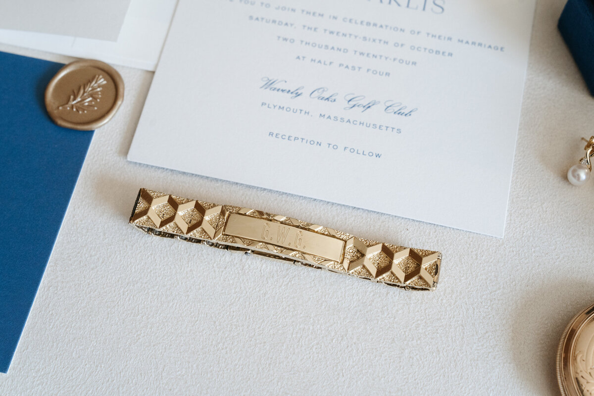 Detail flat lay with wedding rings and stationery at Waverly Oaks