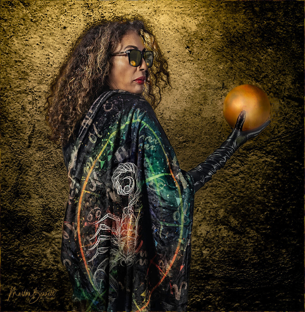 ROMAN TADESE HOLDING PLANET SCORPIO