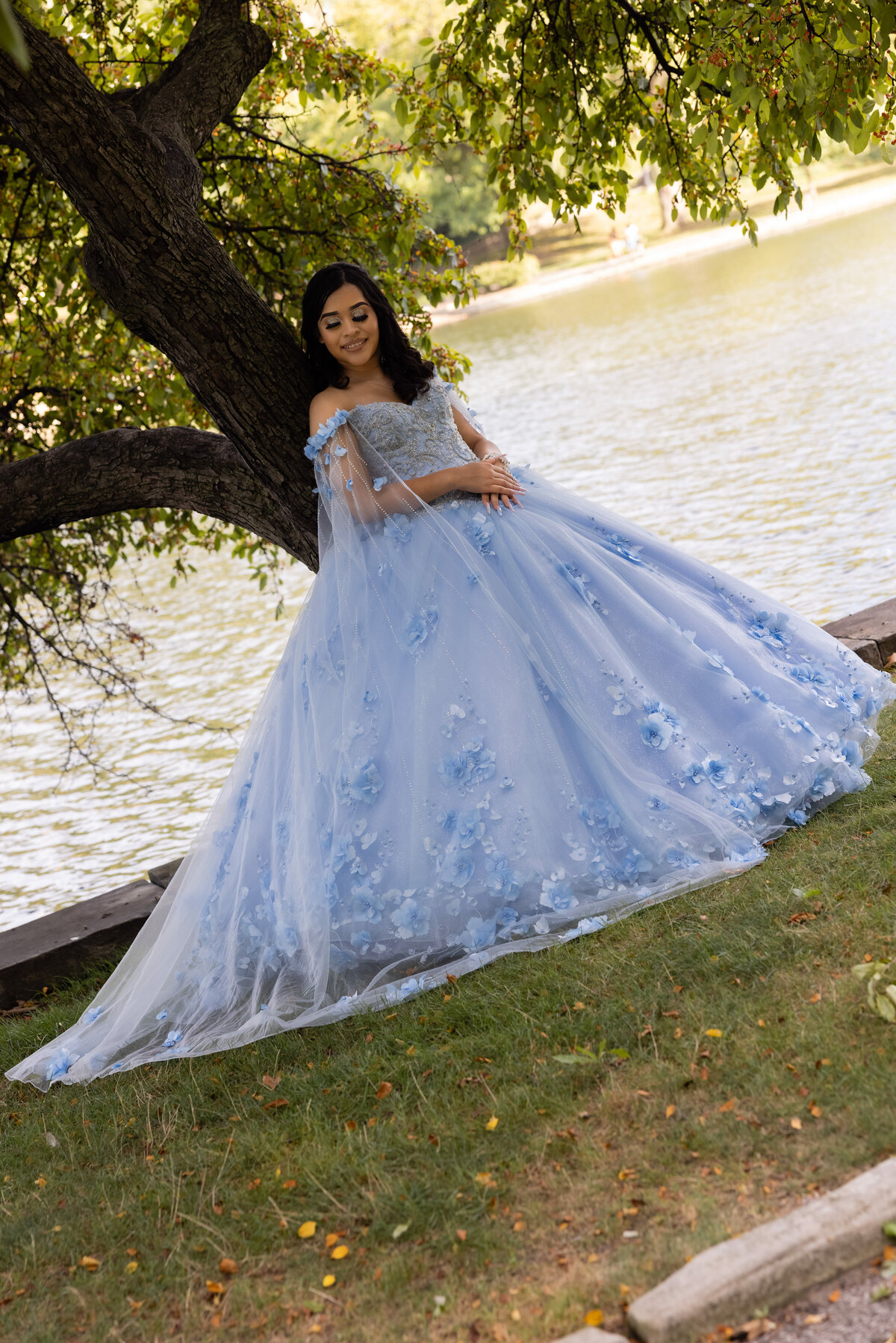 Victoria posing in her quinceañera gown at University Circle, Cleveland, combining urban beauty with her graceful presence.