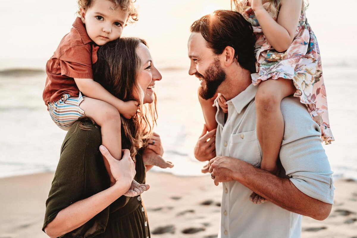 San Diego Photographer captures family playing on beach during San Diego beach family photos