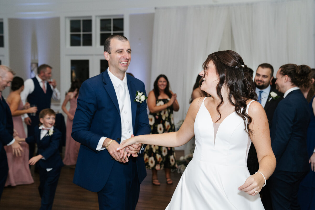 Candid wedding reception moments at Waverly Oaks in Plymouth