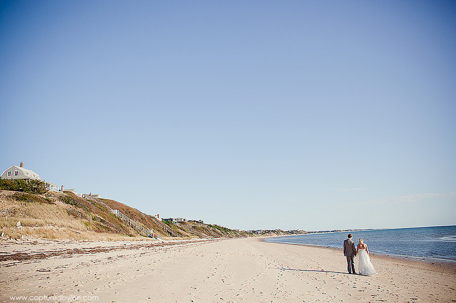 cape code wedding couple walking on beach