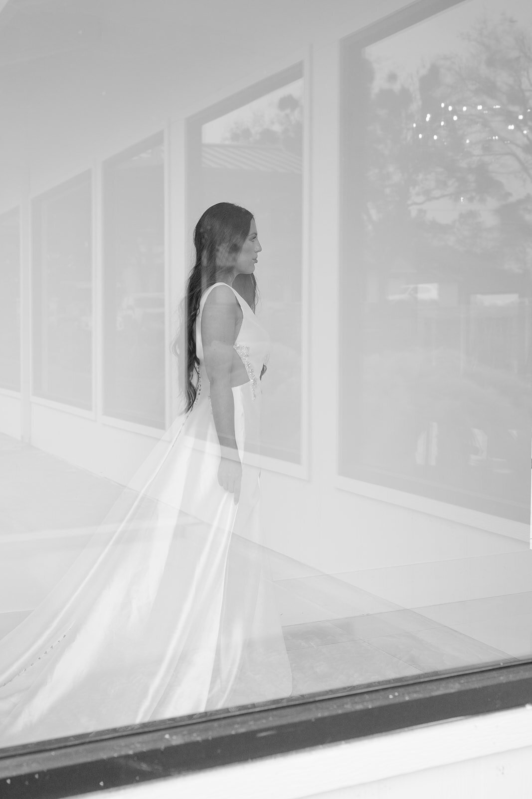 Dreamy bridal portrait with artistic motion effect taken at The Videre Estate wedding venue.