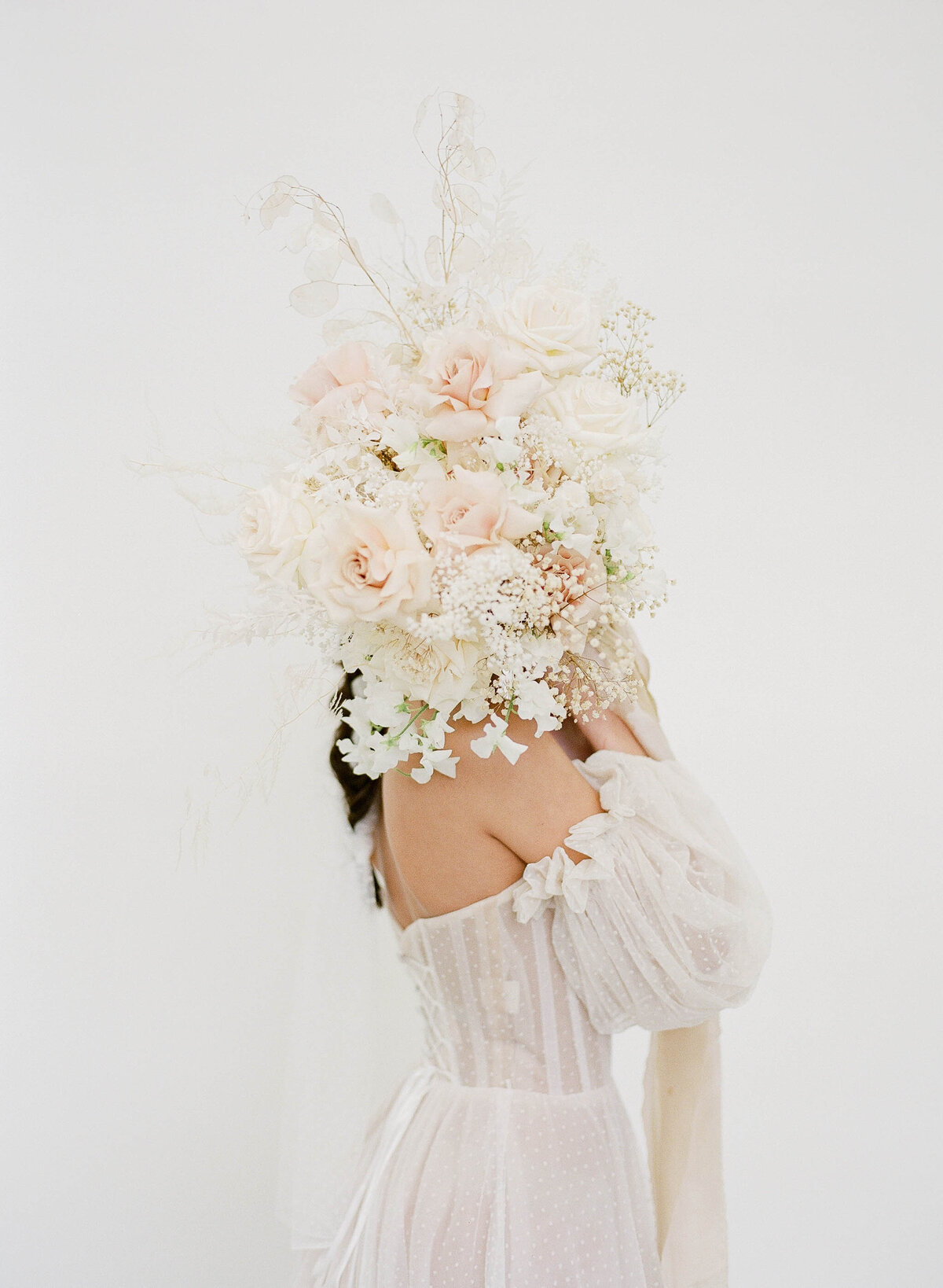 bride in karen willis holmes gown with bouquet fine art wedding photography