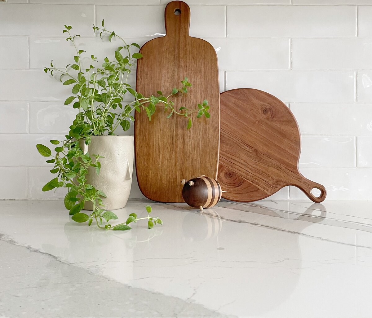 dusti j design wooden accents in white kitchen