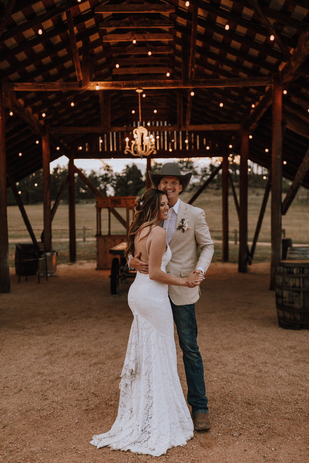 bride and groom dancing at younger ranch