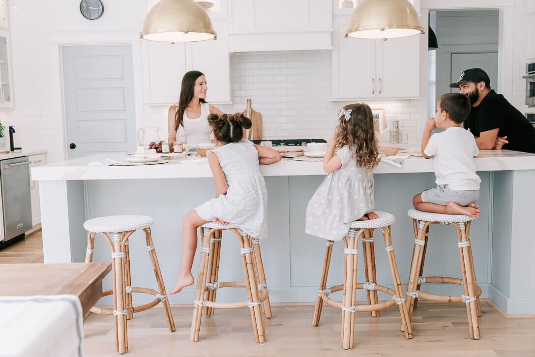 three kids sitting on serena and lily stools