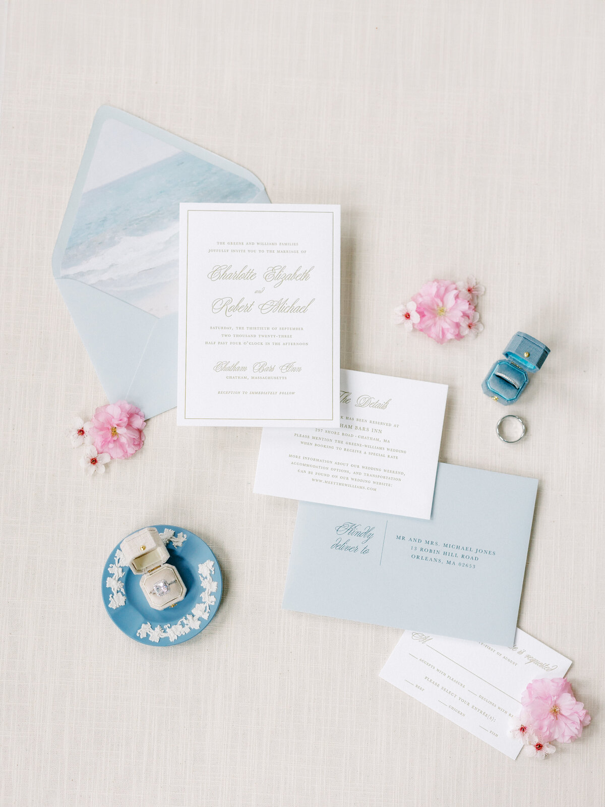 blue and white wedding invitatin suite and blue ring box and dish