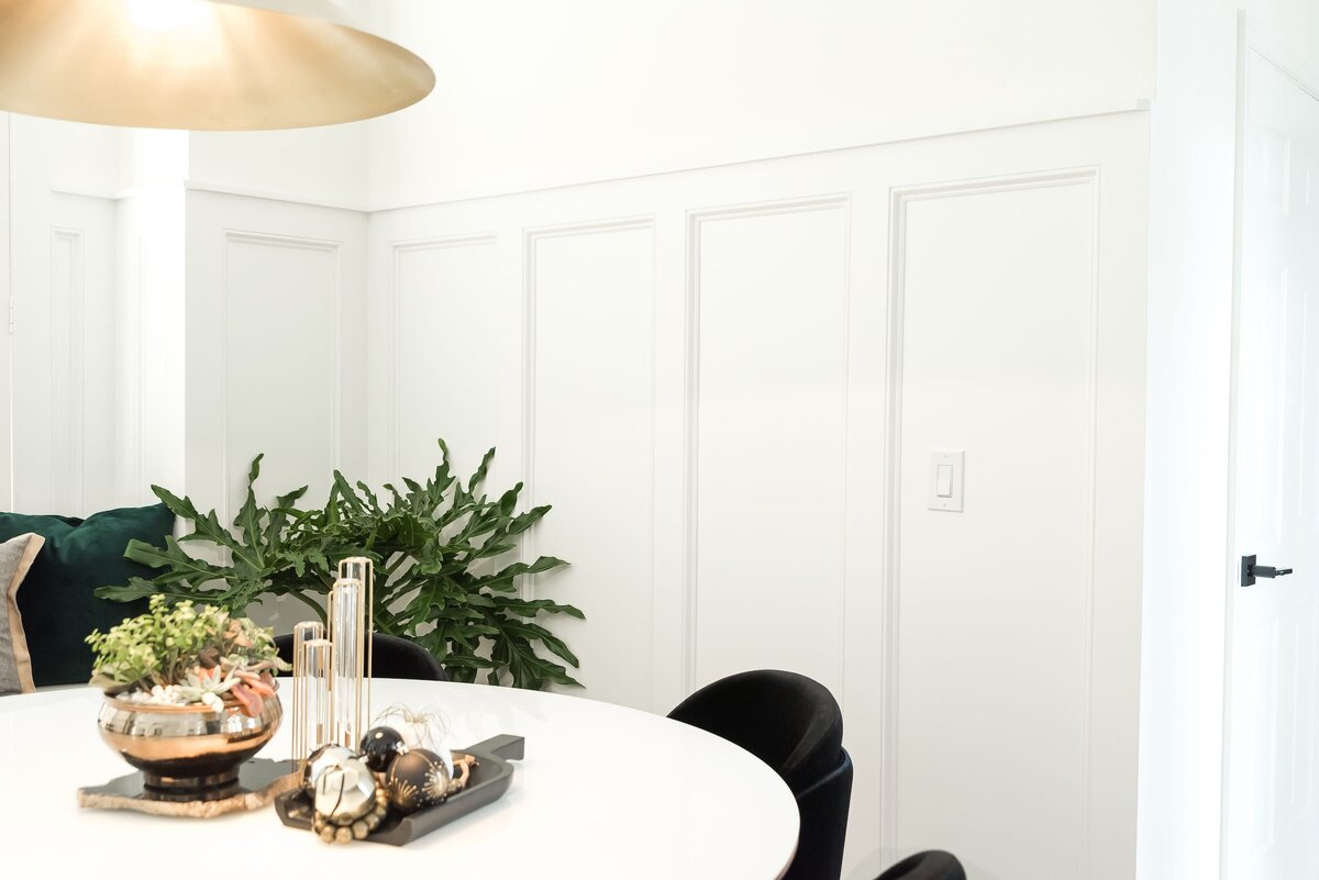 dewine design orlando interior designer modern lakehouse table with plant in corner