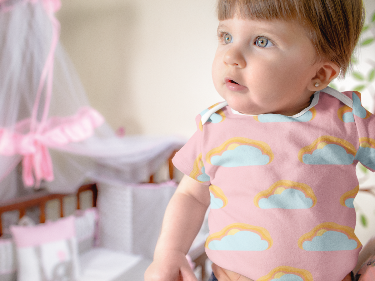 mockup-of-a-beautiful-baby-girl-wearing-a-onesie-in-mommy-s-arms-a16971