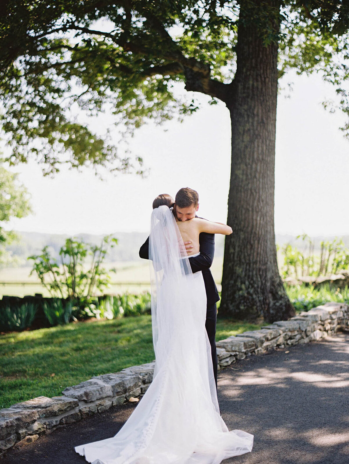 A bride and groom share their first look on their wedding day