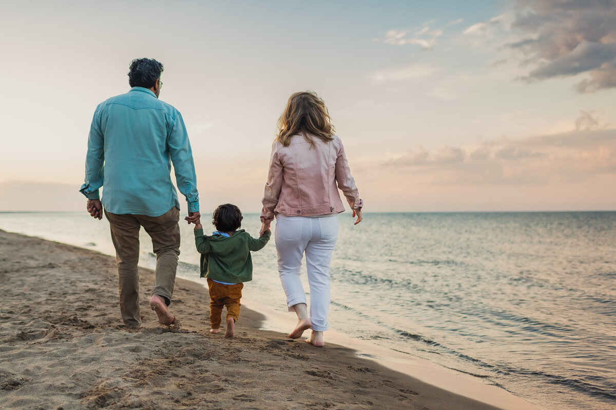 Family walking into the sunset