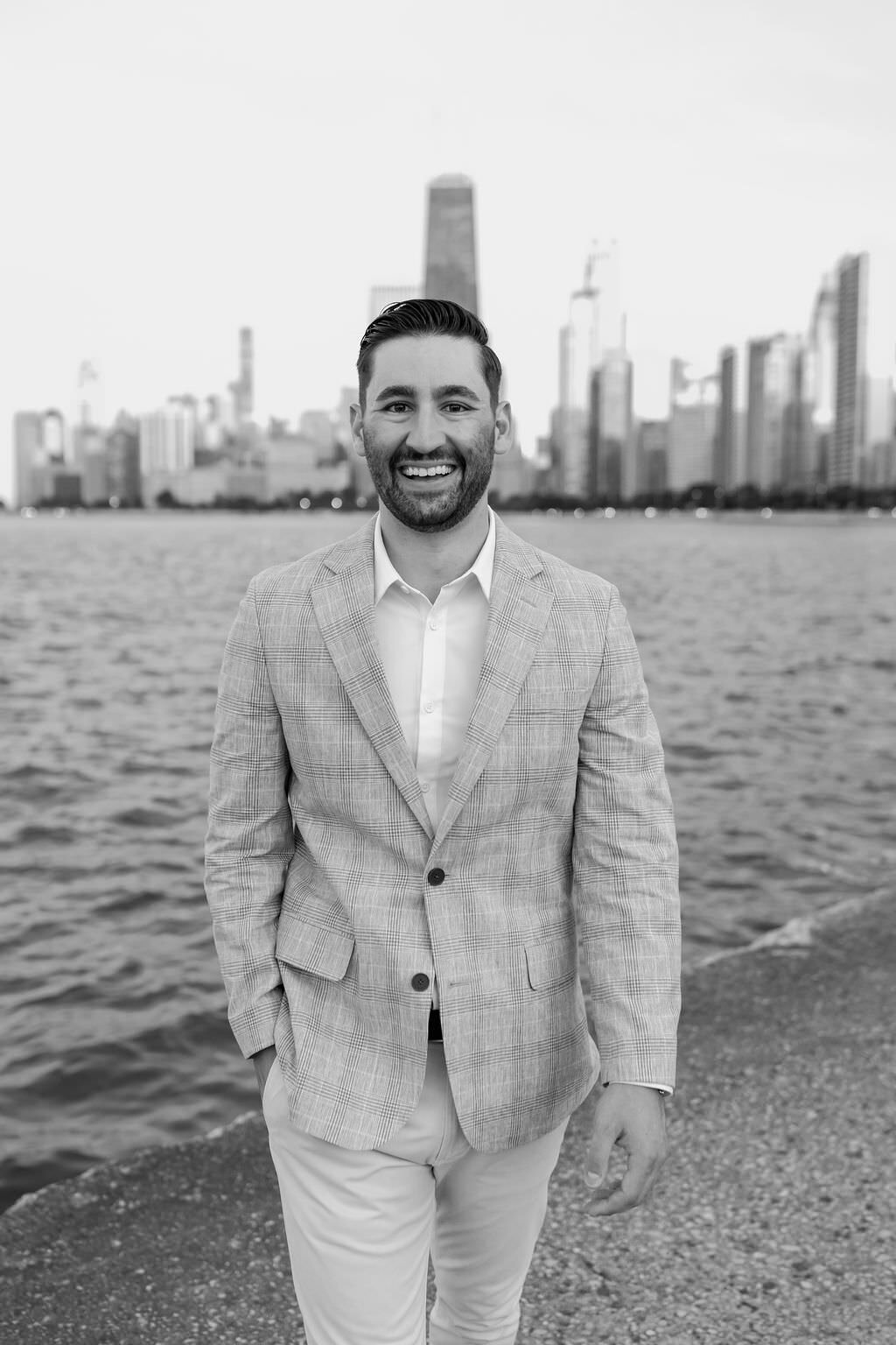 An engagement photography session at The Wrigley Building and North Ave Beach in Chicago, Illinois - 38