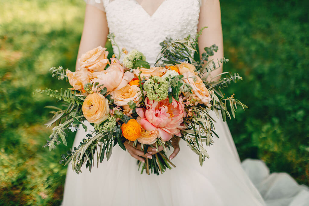 Kaitlin & Joshua wedding - bride holding flowers