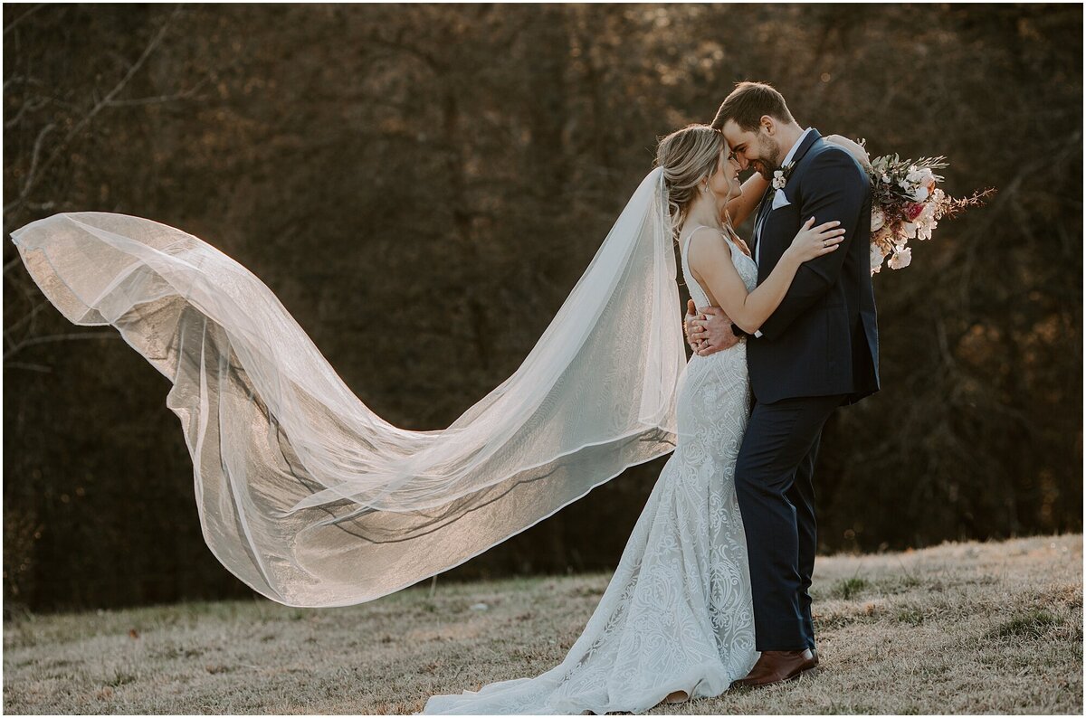 bride-and-groom-field-veil