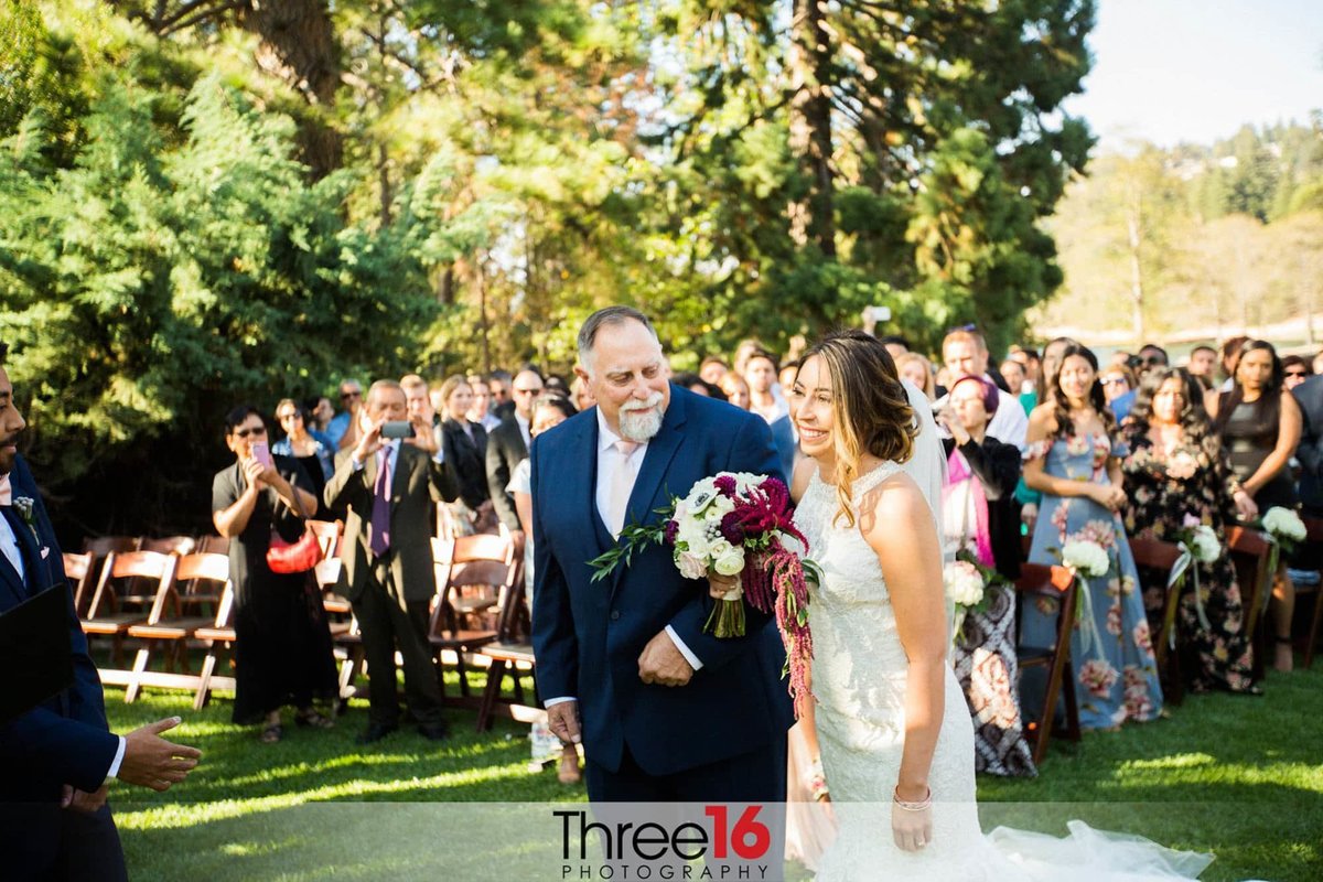 Father of the Bride about to hand his daughter to the Groom