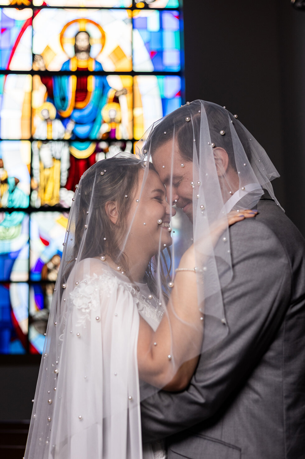 walsh-university-chapel-stained-glass-wedding-portraits