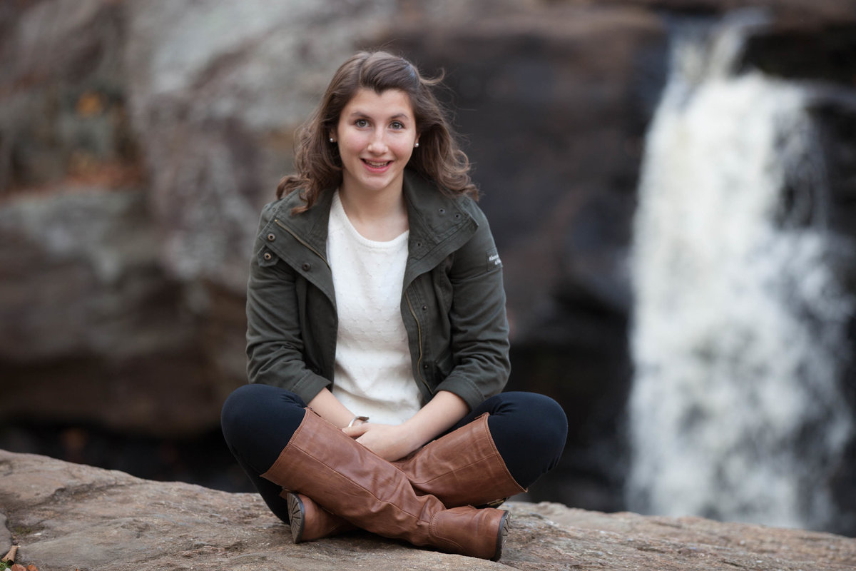 portrait in front of waterfall