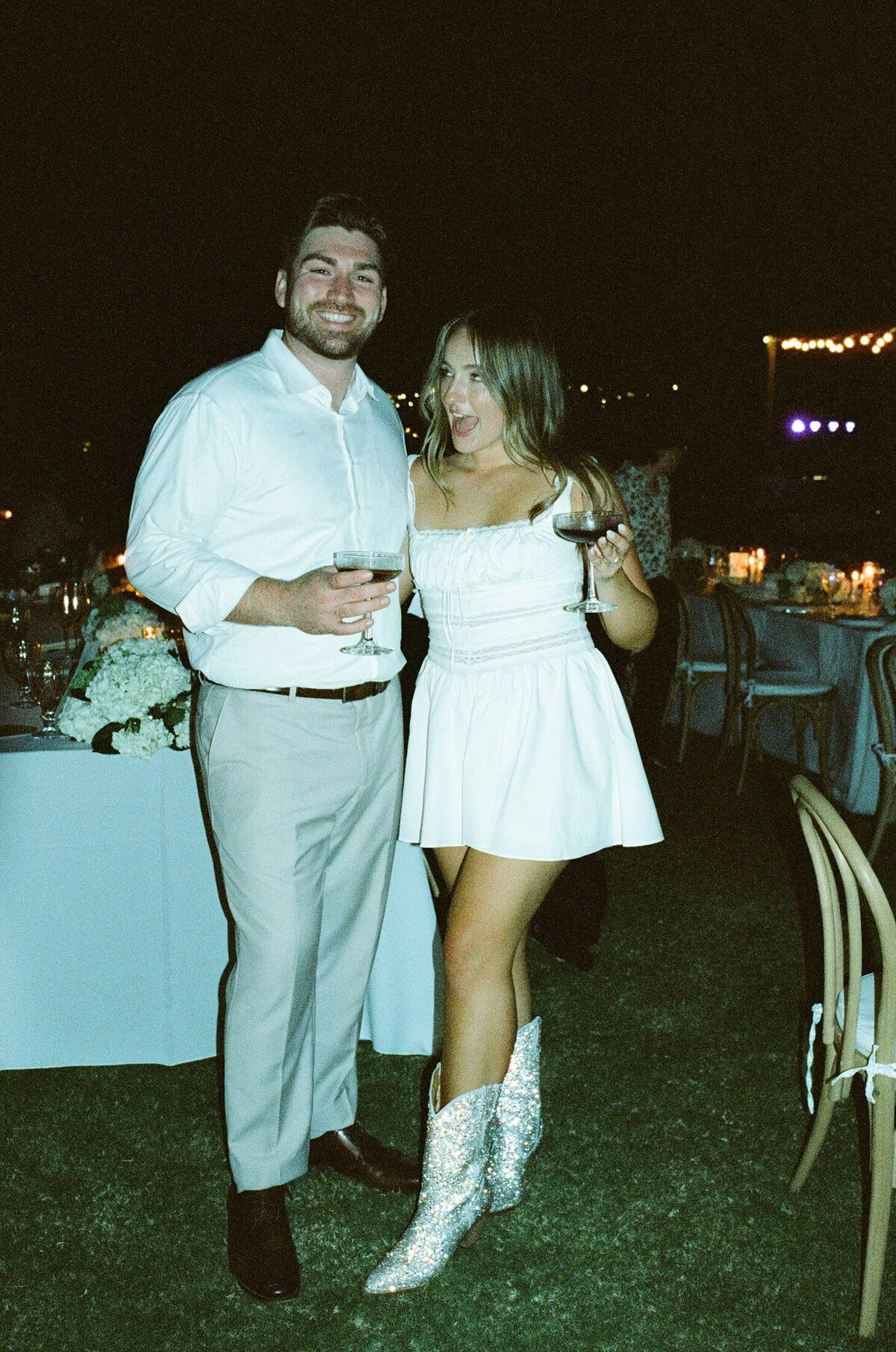 bride and groom with martinis shot on 35mmfilm Cache Estate Indio ca