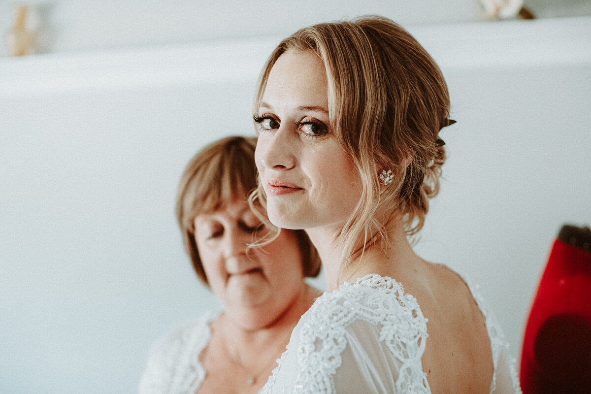 portrait-of-a-bride-looking-at-the-camera-with-a-tear-on-her-cheek-1