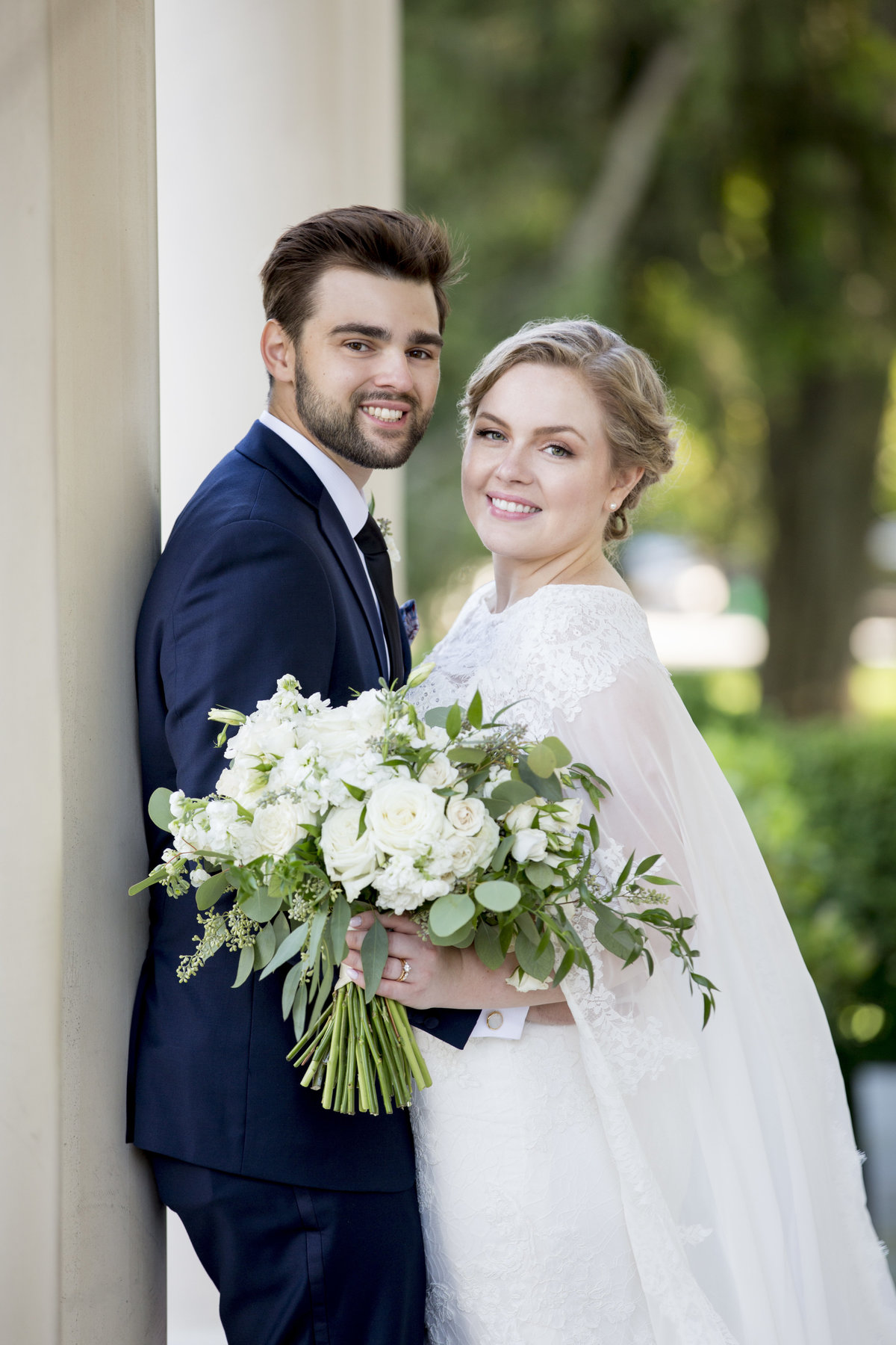 bride and groom in thompson park wedding