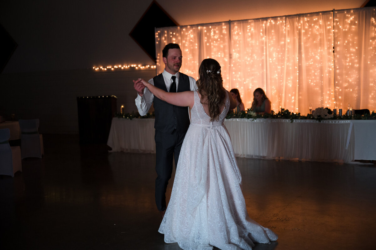bride and groom sharing first dance