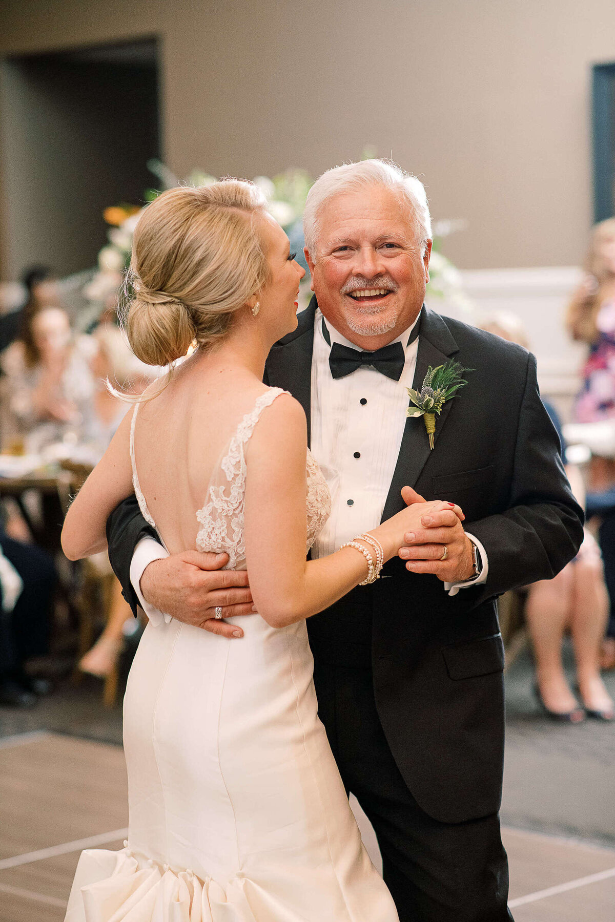 Bride's father dances with bride at wedding reception in Boerne, Texas