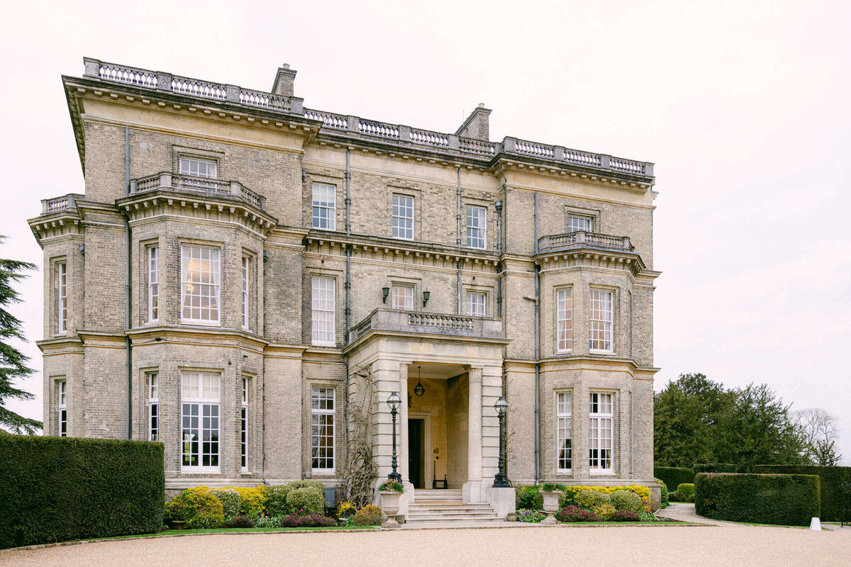 A wedding day drone photo of the wedding venue Hedsor House in the UK