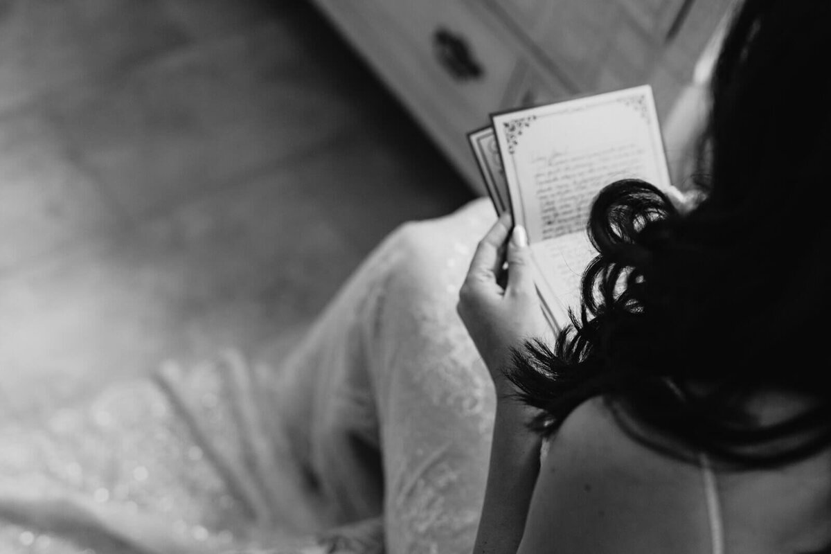 Bride reading hand written vows