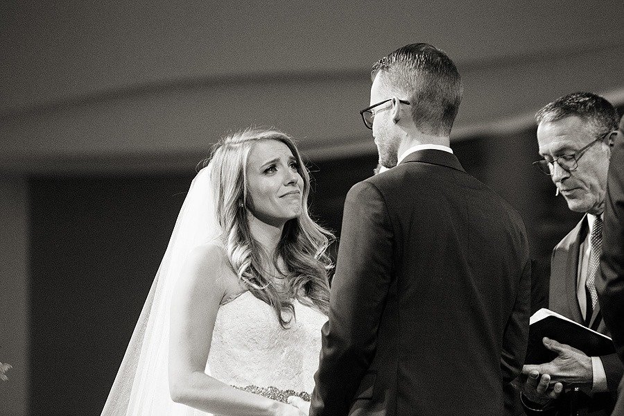 bride looking at groom during ceremony