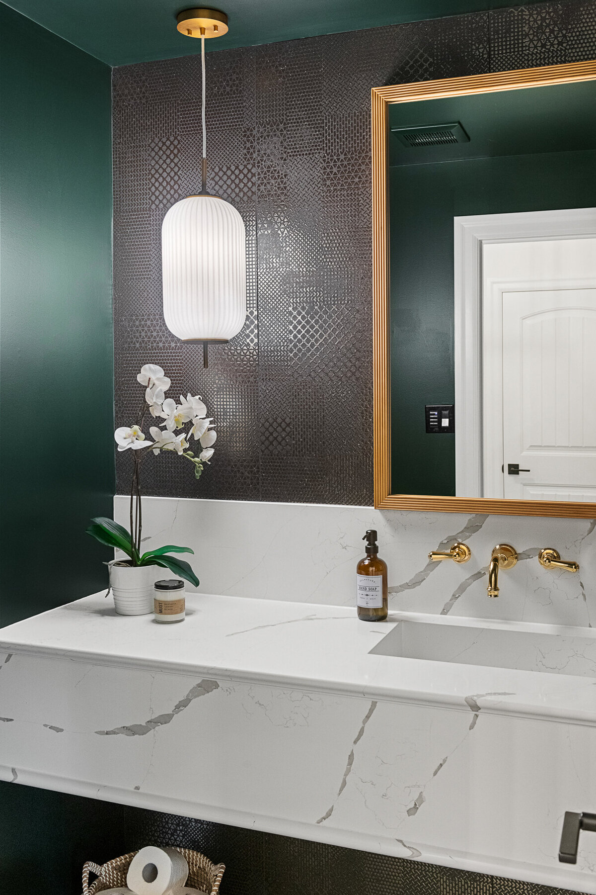 Final image of our moody luxe powder room interior design project.