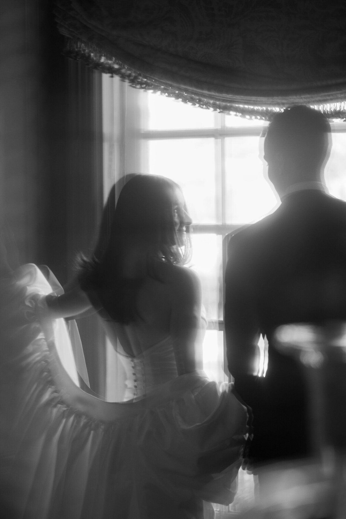 woodstock inn vermont wedding reception black and white image of couple cheersing