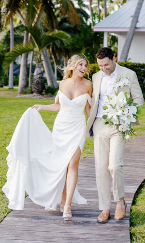 Joyful couple walking at Casitas at Cheeca, captured by Claudia Amalia, a wedding and lifestyle photographer based in Miami and Florida Keys, South Florida. Destination weddings available.