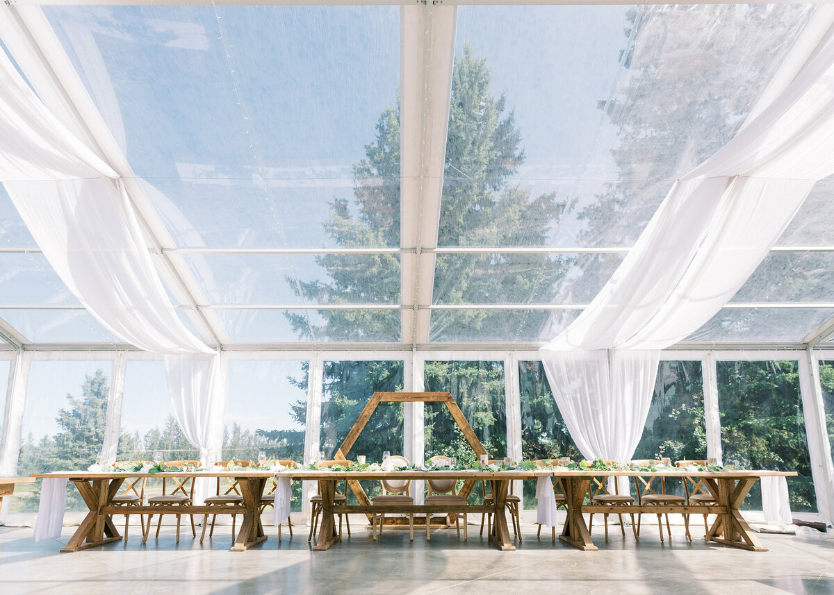 Trendy greenhouse reception decor at the beautiful Pine and Pond Wedding Venue.