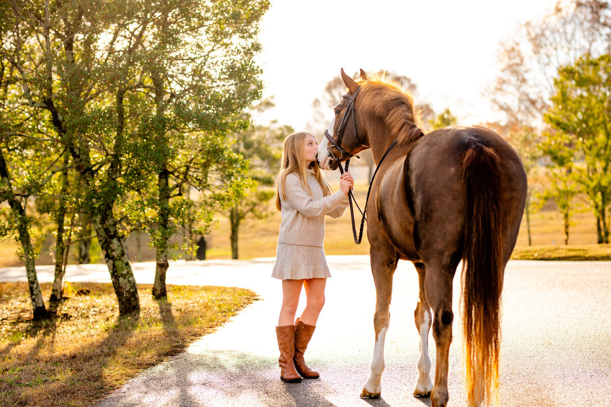 Girl with her pony photographed by professional horse photographer at Black Jack Farms near Birmingham, Alabama.