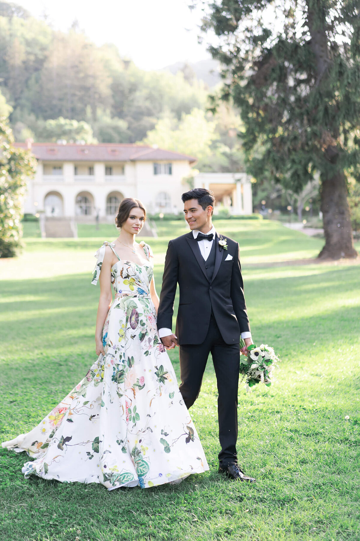 bride and groom walk together on their wedding day at Villa Montalvo in Saratoga CA