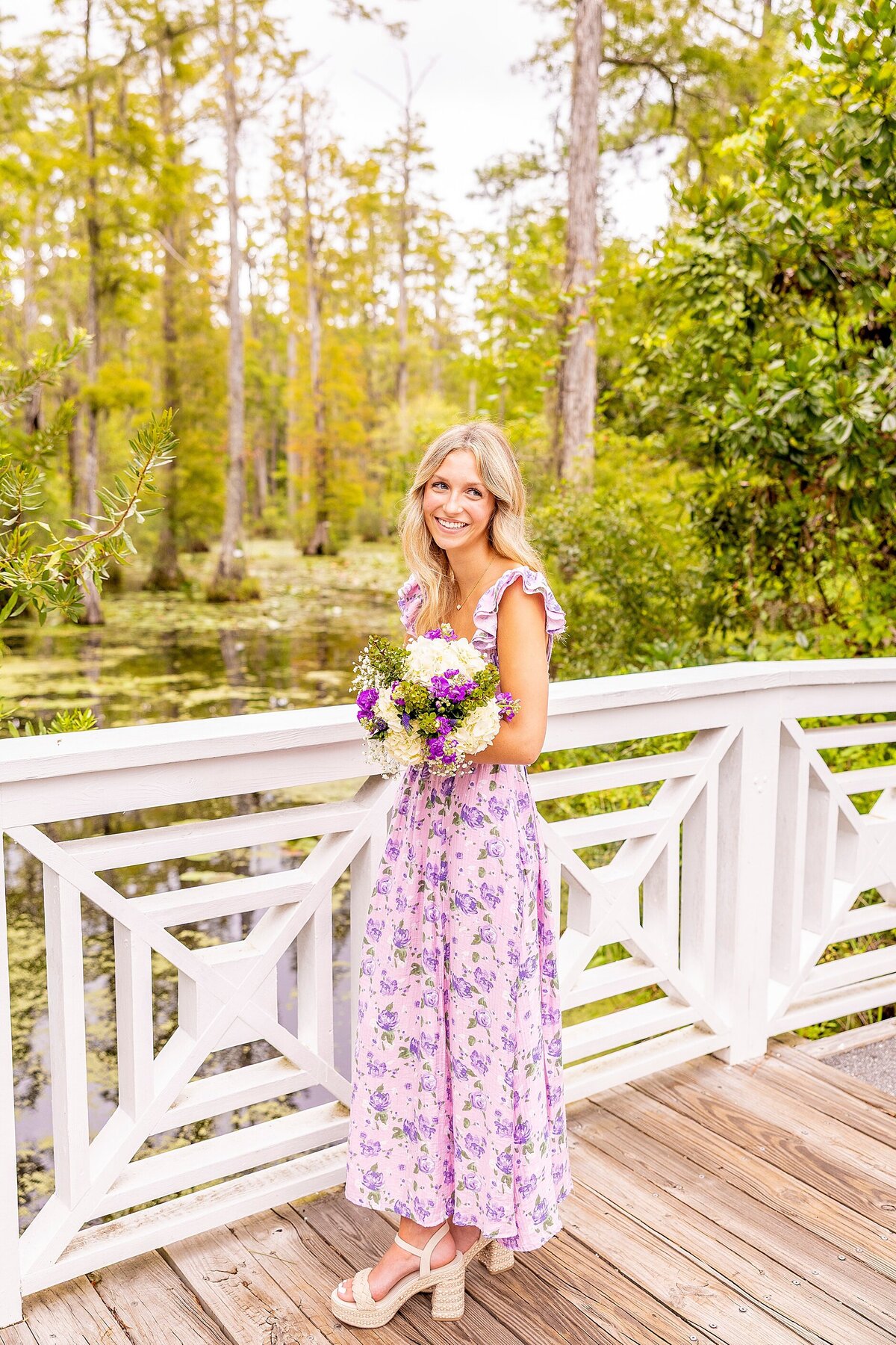 High school senior in Charleston, SC, in golden light with effortless, personality-filled poses
